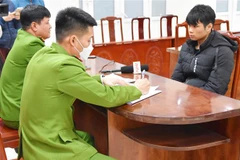 Đối tượng Vũ Đăng Mạnh tại cơ quan điều tra. (Ảnh: Thái Hùng/TTXVN)