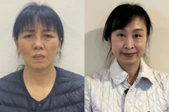 Bị can Nguyễn Thị Thanh Thủy (bên trái) và bị can Nguyễn Bạch Thùy Linh. (Nguồn: TTXVN phát)