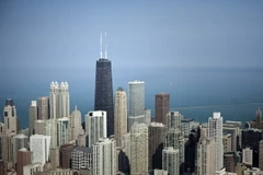 Fed: Kinh tế Mỹ tiếp tục tăng trưởng ở mức khiêm tốn