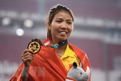Vận động viên Bùi Thị Thu Thảo giành Huy chương Vàng nội dung nhảy xa nữ tại ASIAD 2018. (Nguồn: AFP/TTXVN)