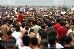 Hội phết Hiền Quan 2018 vẫn diễn ra tình trạng bạo lực. (Ảnh: TTXVN)