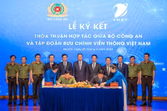 Bộ Công an ký kết hợp tác với Tập đoàn VNPT phát triển lĩnh vực chuyển đổi số. (Ảnh: Minh Sơn/Vietnam+)