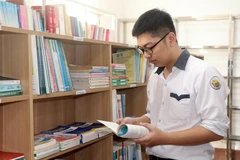 Em Trần Nhật Minh, học sinh lớp 12 chuyên Toán, Trường Trung học phổ thông chuyên Lê Hồng Phong. (Ảnh: Nguyễn Lành/TTXVN)