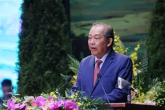 Ông Trương Hòa Bình, Ủy viên Bộ Chính trị, Phó Thủ tướng Thường trực Chính phủ, Trưởng Ban Chỉ đạo Đại hội phát biểu. (Ảnh: TTXVN) 