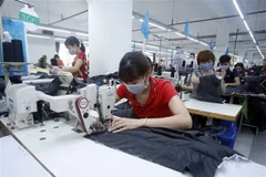 Công nhân ngành dệt may. (Nguồn: TTXVN)