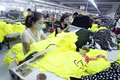 Sản xuất sản phẩm may mặc xuất khẩu. (Nguồn: TTXVN)