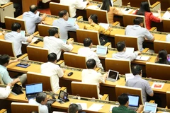 Các đại biểu Quốc hội tham dự phiên họp chiều 10/6. (Ảnh: Dương Giang/TTXVN)