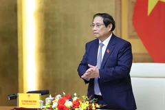 Thủ tướng Phạm Minh Chính tiếp các doanh nghiệp của Hội đồng Kinh doanh Hoa Kỳ - ASEAN. (Ảnh: Dương Giang/TTXVN)