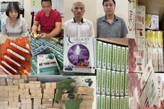 Các đối tượng (từ trái qua phải): Nga, Đôn, Hải, Phúc và tang vật thu được. (Nguồn: Báo Thanh Hóa)