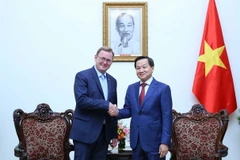 Phó Thủ tướng Lê Minh Khái tiếp Thủ hiến bang Thüringen Bodo Ramelow. (Ảnh: An Đăng/TTXVN)