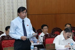 Ông Nguyễn Hạnh Phúc, Chủ nhiệm Văn phòng Quốc hội phát biểu tại Phiên họp. (Ảnh: Nhan Sáng/TTXVN)