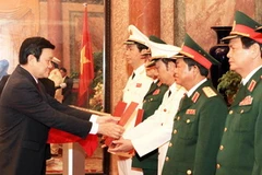 Lễ trao quyết định. (Ảnh: Nguyễn Khang/TTXVN)