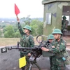 Cán bộ, chiến sĩ Sư đoàn 325 (Quân đoàn 12) duy trì nghiêm chế độ trực sẵn sàng chiến đấu trong dịp Tết Nguyên đán. (Ảnh: Hằng Trần/Vietnam+)