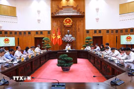 Thủ tướng Lê Minh Hưng chủ trì cuộc họp về phát triển Trung tâm tài chính quốc tế tại Việt Nam. (Ảnh: Dương Giang/TTXVN)