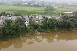 Nhiều ngôi nhà tại khu Phú Hà, phường Phong Châu, tỉnh Phú Thọ bị nứt tường, sụt nền do ảnh hưởng của sạt lở, sụt lún. (Nguồn: TTXVN)