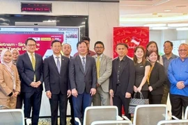 Hội thảo Thương mại Halal Việt Nam - Singapore từ đầu cầu Singapore. (Ảnh: Ngọc Khương/TTXVN)