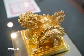 Bảo vật Quốc gia "Ấn Sắc Mệnh Chi Bảo" đúc năm Minh Mạng thứ 8 (1827), dùng để ban cấp cáo sắc cho quan văn, võ cùng phong tặng cho thần và người. (Ảnh: Khánh Hoà/TTXVN)