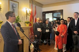 Đại sứ Việt Nam tại Canada Phạm Vinh Quang phát biểu chúc Tết cộng đồng người Việt tại Canada. (Nguồn: TTXVN)