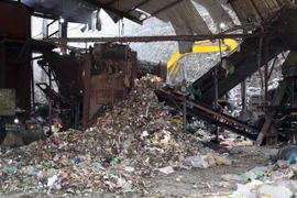 Các thiết bị của Nhà máy đã hoạt động ổn định sau khi được doanh nghiệp đầu tư trở lại. (Ảnh: TTXVN phát)