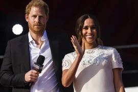 Hoàng tử Harry với người vợ Meghan. (Nguồn: AFP)