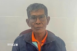 Đối tượng Sơn Hiệp tại cơ quan Công an. (Ảnh: TTXVN phát)