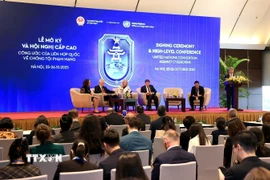 Quang cảnh một phiên tọa đàm trong khuôn khổ Lễ mở ký và Hội nghị cấp cao Công ước của Liên hợp quốc về Chống tội phạm mạng (Công ước Hà Nội).(Ảnh: TTXVN)