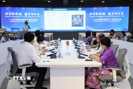 Sự kiện thu hút nhiều đại diện truyền thông cấp cao và chuyên gia học thuật từ Trung Quốc và các nước ASEAN tham dự. (Ảnh: Quang Hưng/TTXVN)