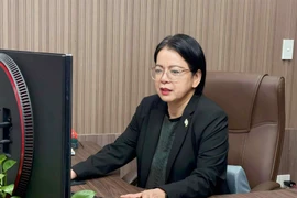 Với kinh nghiệm gần 30 năm gắn bó với nghiệp số, bà Võ Thị Trung Trinh luôn đặt mục tiêu tối thượng đặt "người dân làm vị trí trung tâm." (Nguồn: Hữu Duyên/TTXVN)