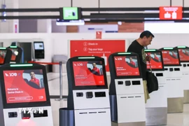 Quầy làm thủ tục tại sân bay Sydney, Australia. (Ảnh: THX/TTXVN)