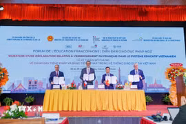 Lễ ký Tuyên bố chung về giảng dạy tiếng Pháp và bằng tiếng Pháp trong hệ thống giáo dục tại Việt Nam. (Ảnh: Sỹ Thắng/TTXVN)