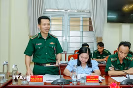 Đại tá Phạm Lê Xuân Bình, Chỉ huy trưởng Ban chỉ huy Bộ đội Biên phòng thành phố Cần Thơ báo cáo kết quả phòng chống khai thác IUU. (Ảnh: Trung Kiên/TTXVN)