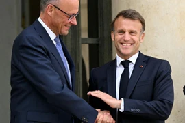Tổng thống Pháp Emmanuel Macron và tân Thủ tướng Đức Friedrich Merz. (Nguồn: AFP)