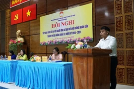 Hội nghị tiếp xúc giữa cử tri xã Nam Trà My với người ứng cử đại biểu HĐND thành phố Đà Nẵng. (Ảnh: Quốc Dũng/TTXVN)