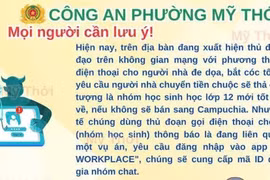 Cảnh báo được Công an phường Mỹ Thới (An Giang) nhằm tuyên truyền, khuyến cáo người dân. (Ảnh: TTXVN phát)