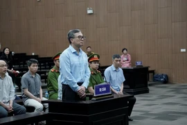 Cựu Thứ trưởng Bộ Công thương Hoàng Quốc Vượng tại phiên tòa. (Ảnh: Kim Anh/TTXVN)