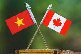Quốc kỳ Việt Nam và Quốc kỳ Canada.