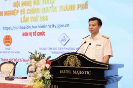 Ông Giang Văn Hiển, Phó Trưởng Thuế Thành phố Hồ Chí Minh phát biểu tại hội nghị.( Ảnh: Xuân Anh/TTXVN)