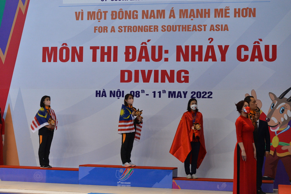 Đoàn thể thao Malaysia xuất sắc giành tới hai huy chương vàng trong buổi chiều thi đấu ở môn nhảy cầu. (Ảnh: PV/Vietnam+)