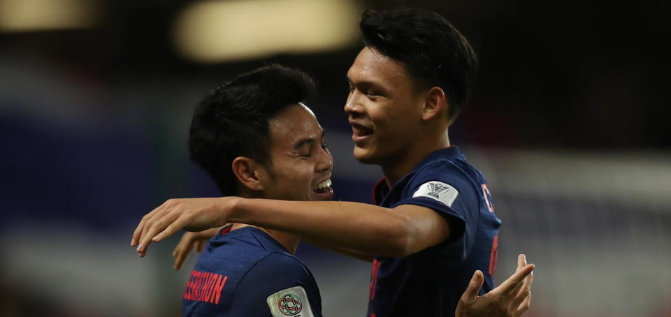 Supachai Jaided (phải) là người đã lập công cho đội tuyển Thái Lan. (Nguồn: AFC)