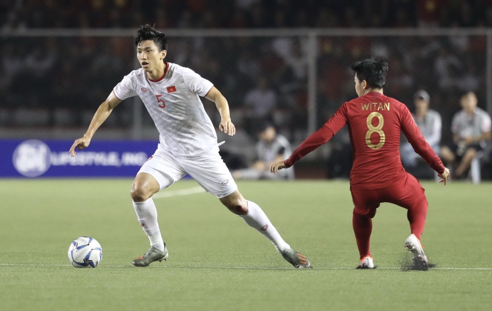 ...để hạn chế lối chơi của U22 Indonesia. (Ảnh: Hoàng Linh/TTXVN)