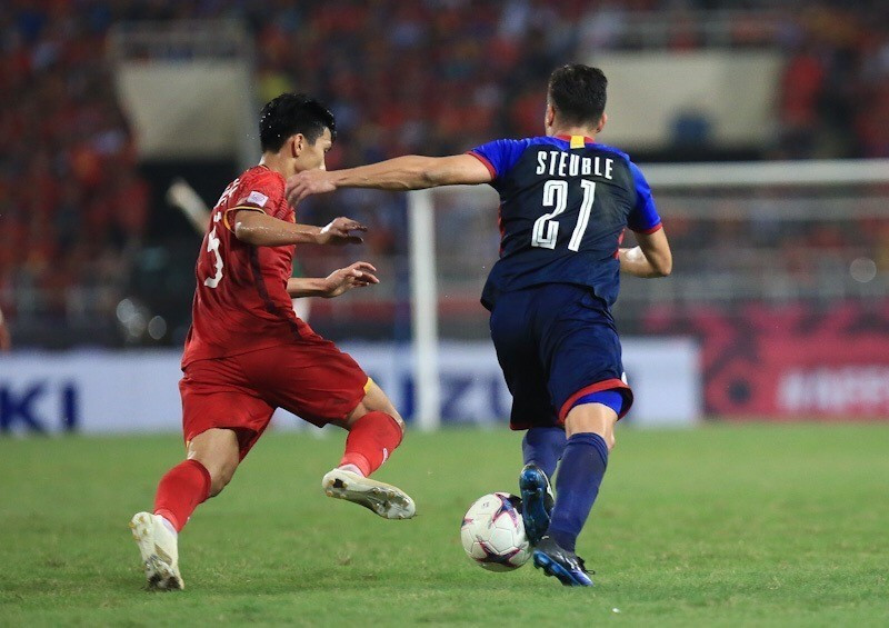 Và phải đến phút 83, thế cân bằng mới được phá vỡ...(Ảnh: Trọng Đạt/TTXVN)