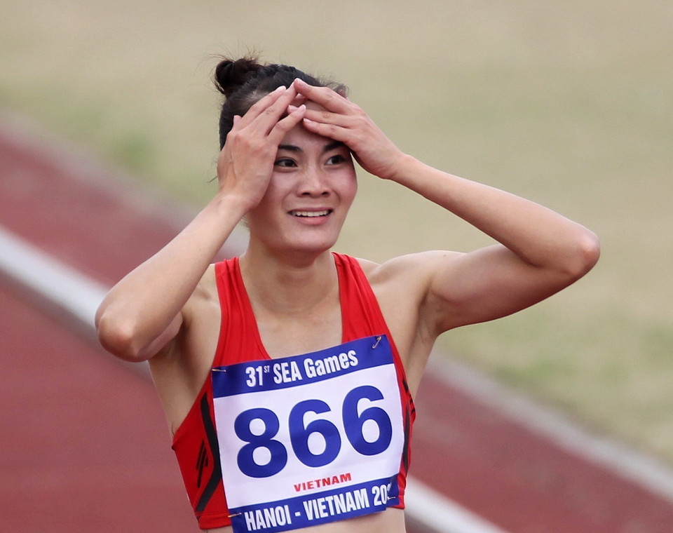 Quách Thị Lan bất ngờ với thành tich mình đạt được trên đường chạy chung kết. (Ảnh: Quốc Khánh/TTXVN)