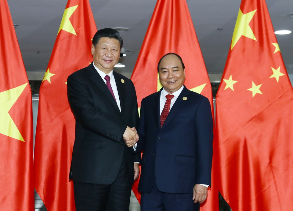 Thủ tướng Nguyễn Xuân Phúc hội kiến Tổng Bí thư, Chủ tịch Trung Quốc Tập Cận Bình. (Ảnh: TTXVN)