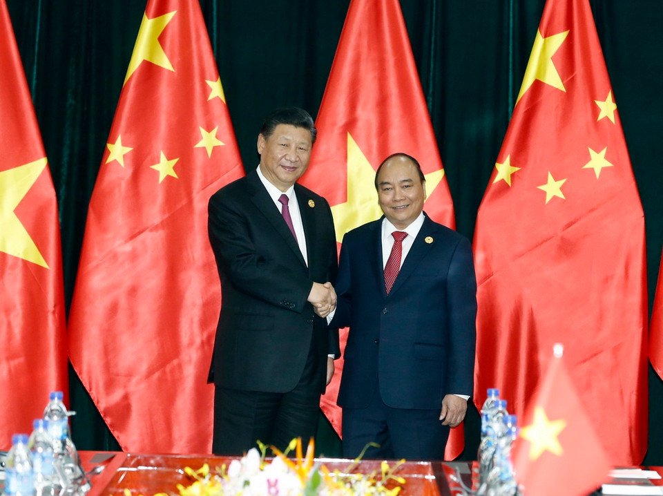 Thủ tướng Nguyễn Xuân Phúc hội kiến Tổng Bí thư, Chủ tịch Trung Quốc Tập Cận Bình. (Ảnh: TTXVN)