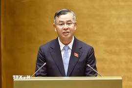 Bộ trưởng Bộ Tài chính Ngô Văn Tuấn trình bày tóm tắt Tờ trình về tình hình thực hiện ngân sách Nhà nước năm 2026, dự toán ngân sách Nhà nước, phương án phân bổ ngân sách Trung ương năm 2027. (Ảnh: TTXVN)