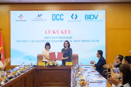 Sở giao dịch Chứng khoán Hà Nội ký kết các Biên bản phối hợp với Tổng công ty Lưu ký và Bù trừ Chứng khoán Việt Nam. (Ảnh: Vietnam+) 