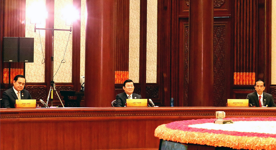  Chủ tịch nước Trương Tấn Sang dự Phiên họp kín thứ nhất về ” Thúc đẩy liên kết kinh tế khu vực”. (Ảnh: Nguyễn Khang/TTXVN) 