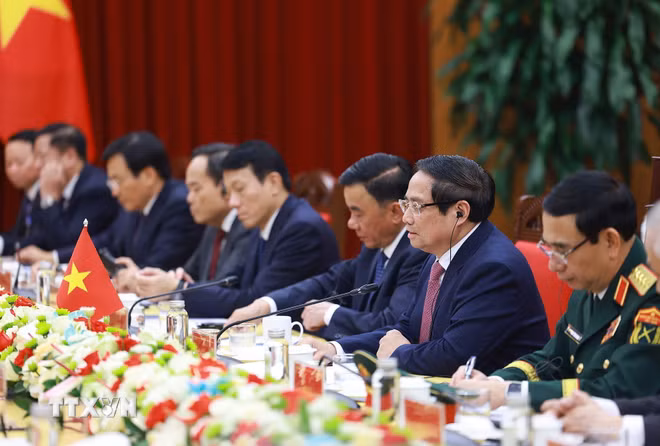 ttxvn-thu-tuong-hoi-kien-tong-bi-thu-chu-tich-trung-quoc-tap-can-binh-3.jpg