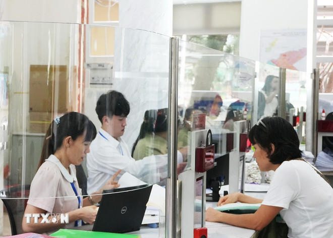 Đảm bảo đồng bộ, liên thông thủ tục hành chính khi triển khai chính quyền 2 cấp ttxvn-chinh-quyen-dia-phuong-2-cap-tphcm.jpg