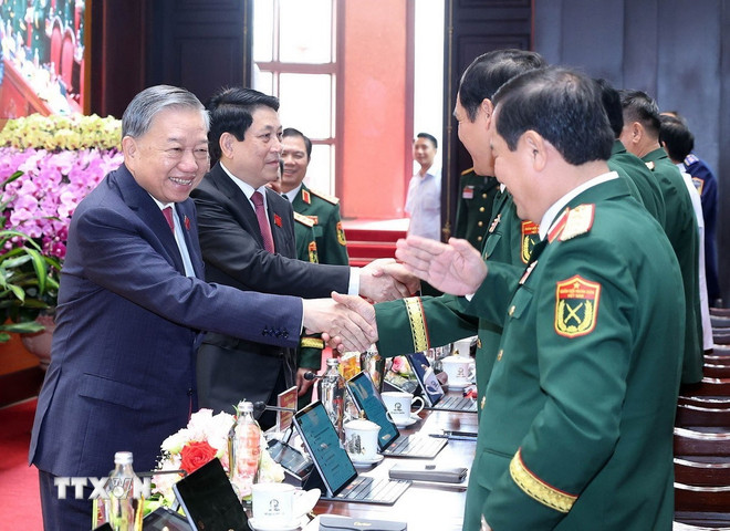 Tổng Bí thư Tô Lâm, Chủ tịch nước Lương Cường và các đại biểu. (Ảnh: Thống Nhất/TTXVN) ttxvn-tong-bi-thu-be-mac-dai-hoi-dang-bo-quan-doi-4.jpg